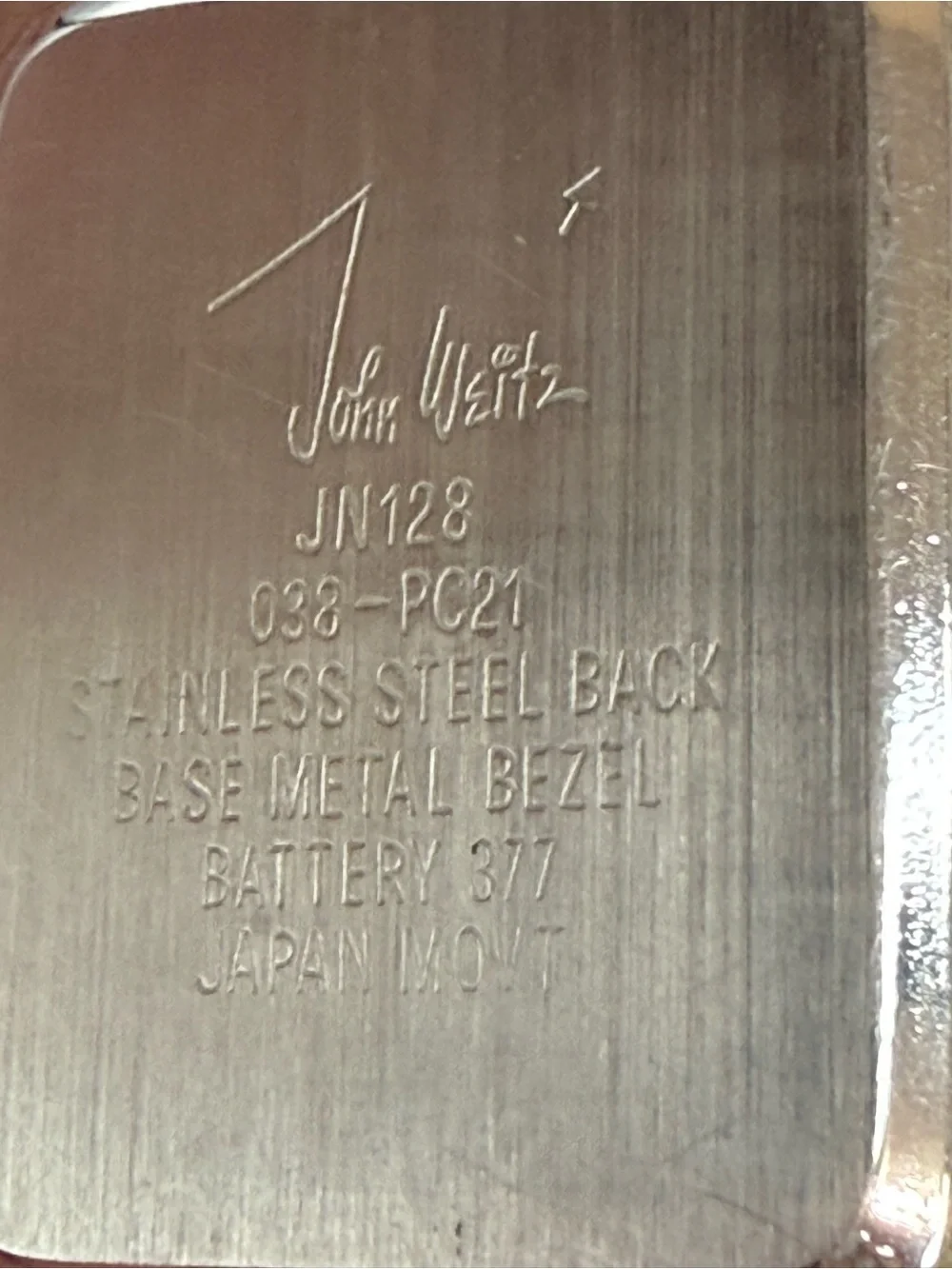 vintage John Weitz two-tone watch rectangular case textured expansion band.